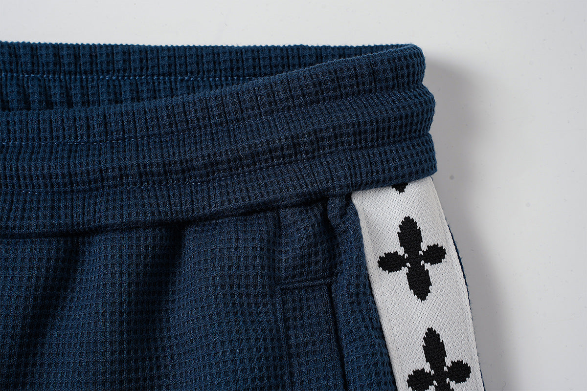 Pantalon de survêtement large à bandes latérales – Pantalon baggy en maille gaufrée
