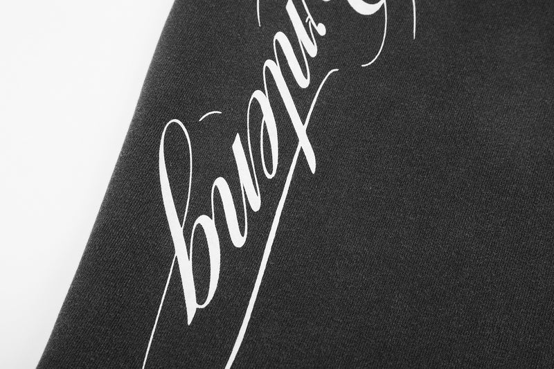 Pantalon de survêtement baggy wide leg avec imprimé gothique Madonna et typographie – Streetwear délavé