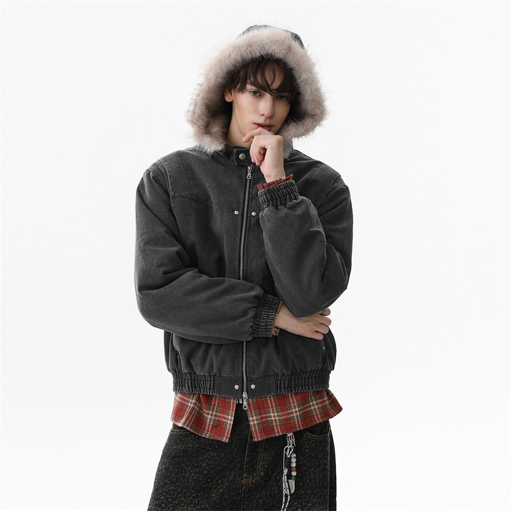 Oversized washed canvas padded bomber jacket with detachable faux fur-trimmed hood, shown in washed black and khaki colorways
