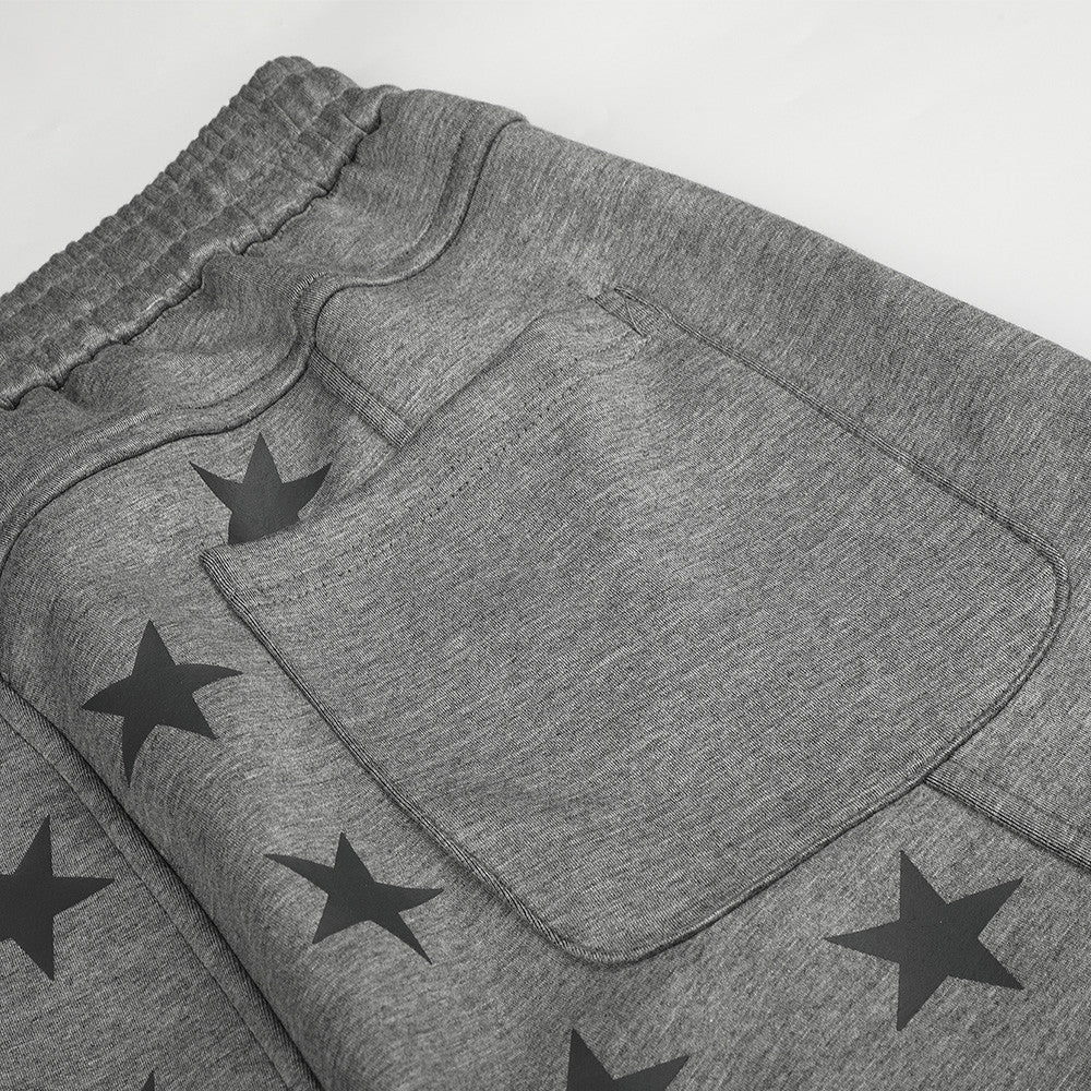 Pantalon de survêtement à jambes larges et imprimé étoiles – Polaire gris chiné à empiècement contrasté