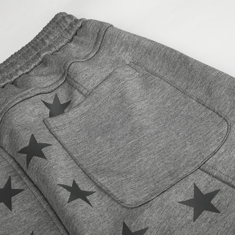 Pantalon de survêtement à jambes larges et imprimé étoiles – Polaire gris chiné à empiècement contrasté