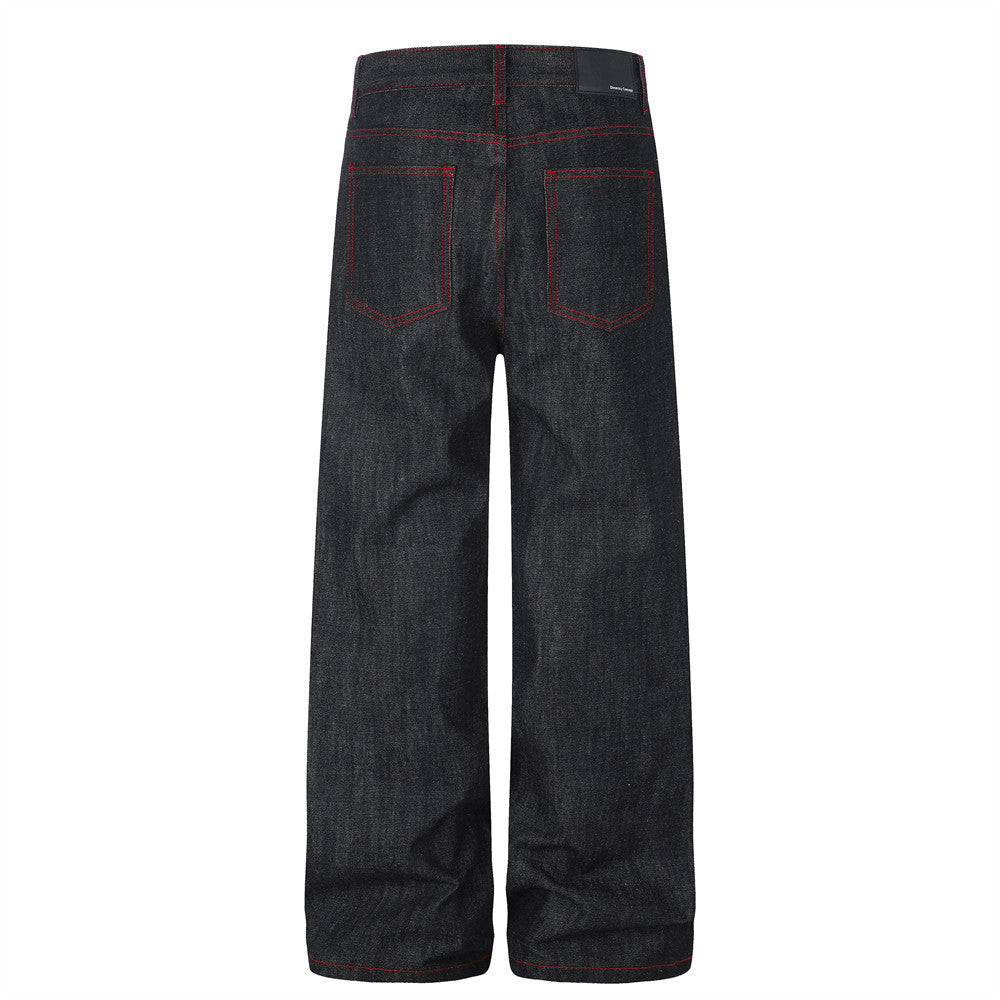 Jean à jambes larges – Denim noir avec surpiqûres rouges contrastantes et broderie script