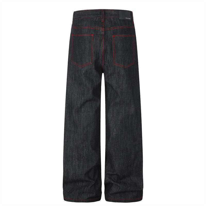 Jean à jambes larges – Denim noir avec surpiqûres rouges contrastantes et broderie script