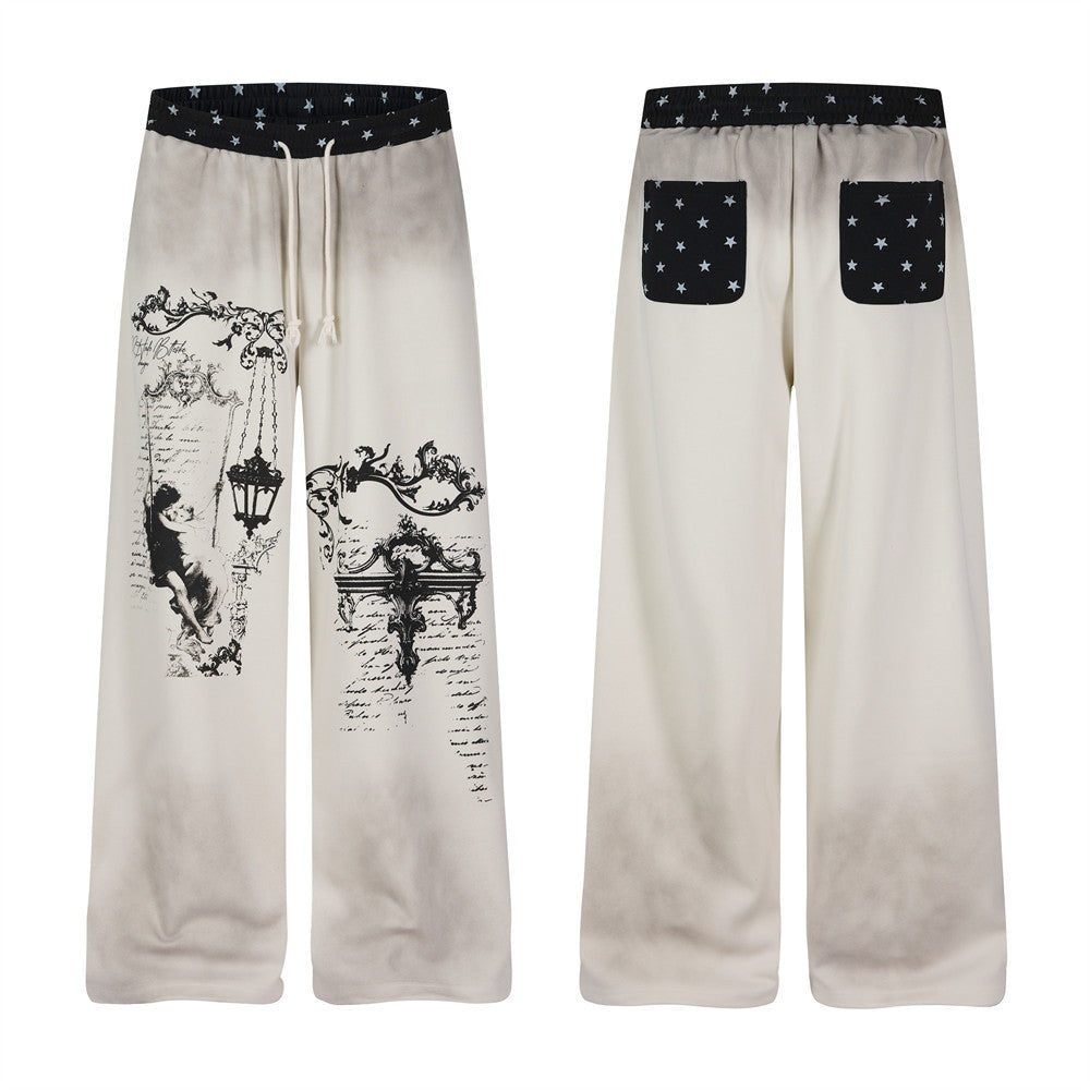 Pantalon de survêtement à jambes larges motif baroque – Imprimé usé, ceinture à étoiles
