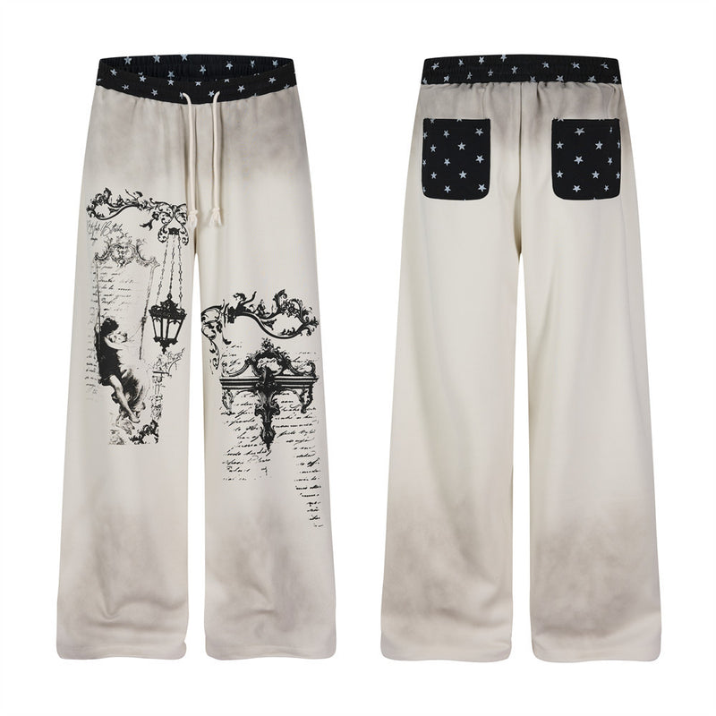 Pantalon de survêtement à jambes larges motif baroque – Imprimé usé, ceinture à étoiles