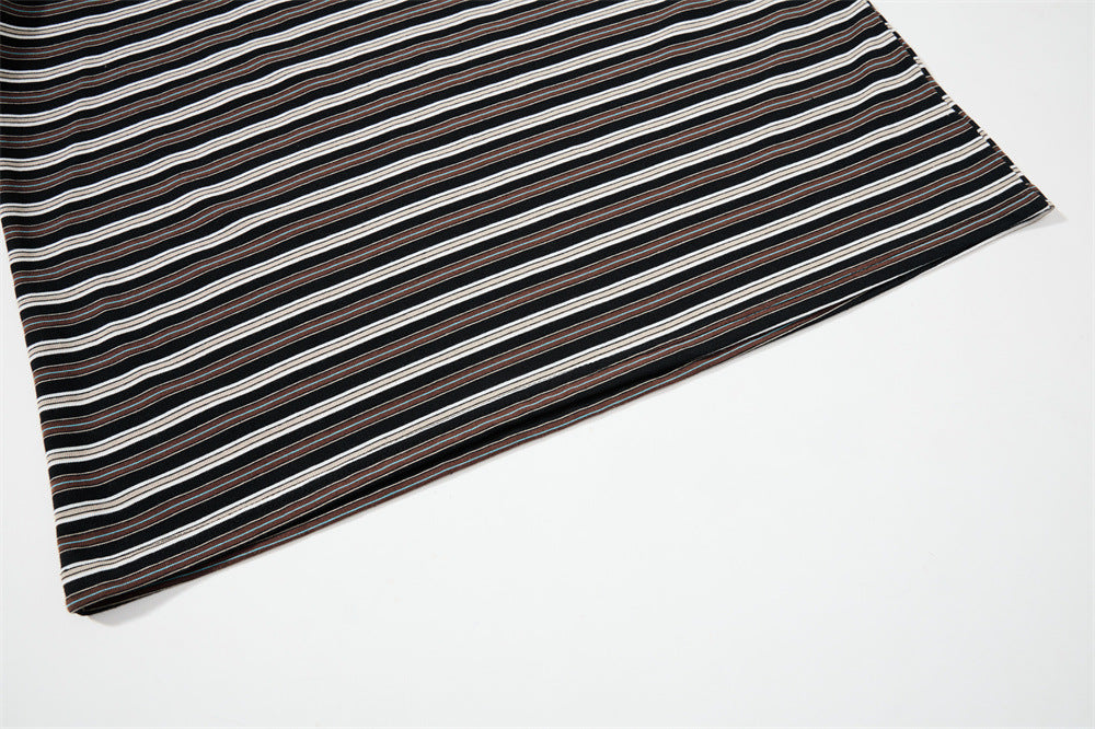 Close-up of black striped fabric laid flat