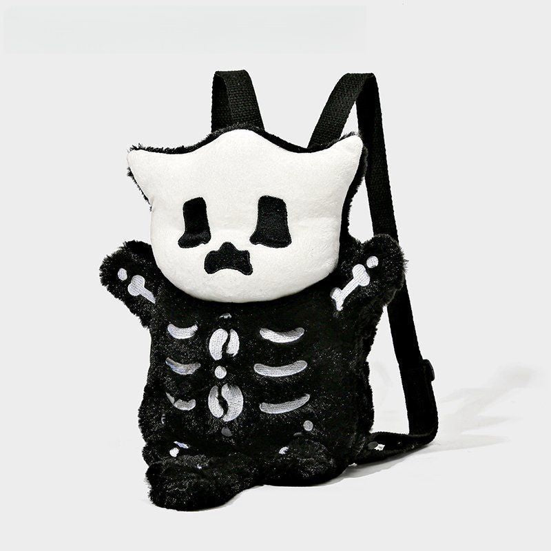 The Seakoff Spooky Skeleton Plush Backpack features a black body with white bones, adjustable straps, and a playful skull with black eyes and mouth on top—perfect as a Halloween accessory!.