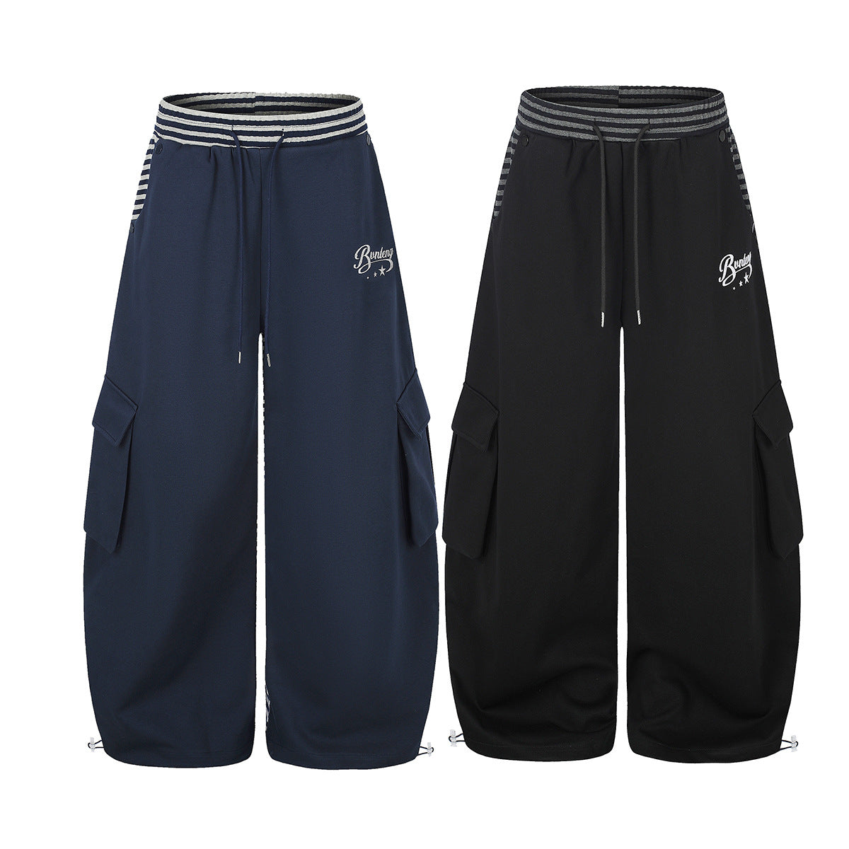 Wide-leg cargo sweatpants in navy blue and black with striped waistband, flap cargo pockets, and embroidered logo