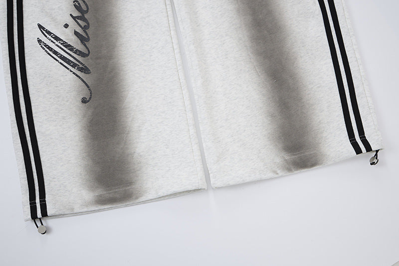 Wide-Leg-Sweatpants mit Colorblock-Doppelbund und Varsity-Grafikprint