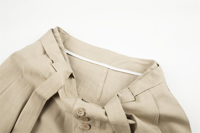 Wide-Leg Pleated Trousers with Button Fly and Belt Ties