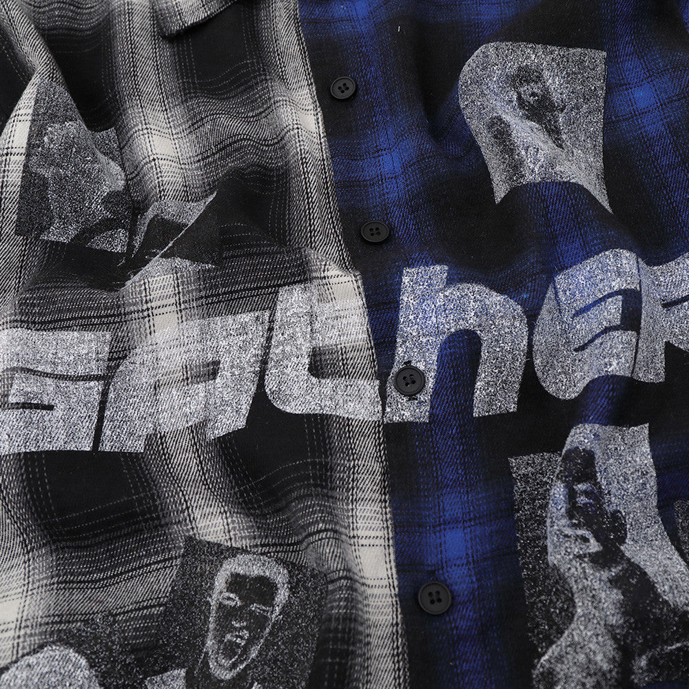 Close-up of Gather graphic print and black button placket on plaid shirt