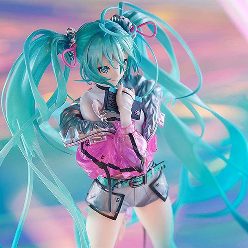 The Hatsune Miku 24cm PVC Figure captures the essence of an anime character with turquoise twin tails, wearing a metallic jacket over a pink vest and shorts, set against a colorful gradient background. This high-quality Vocaloid collectible embodies the brand&