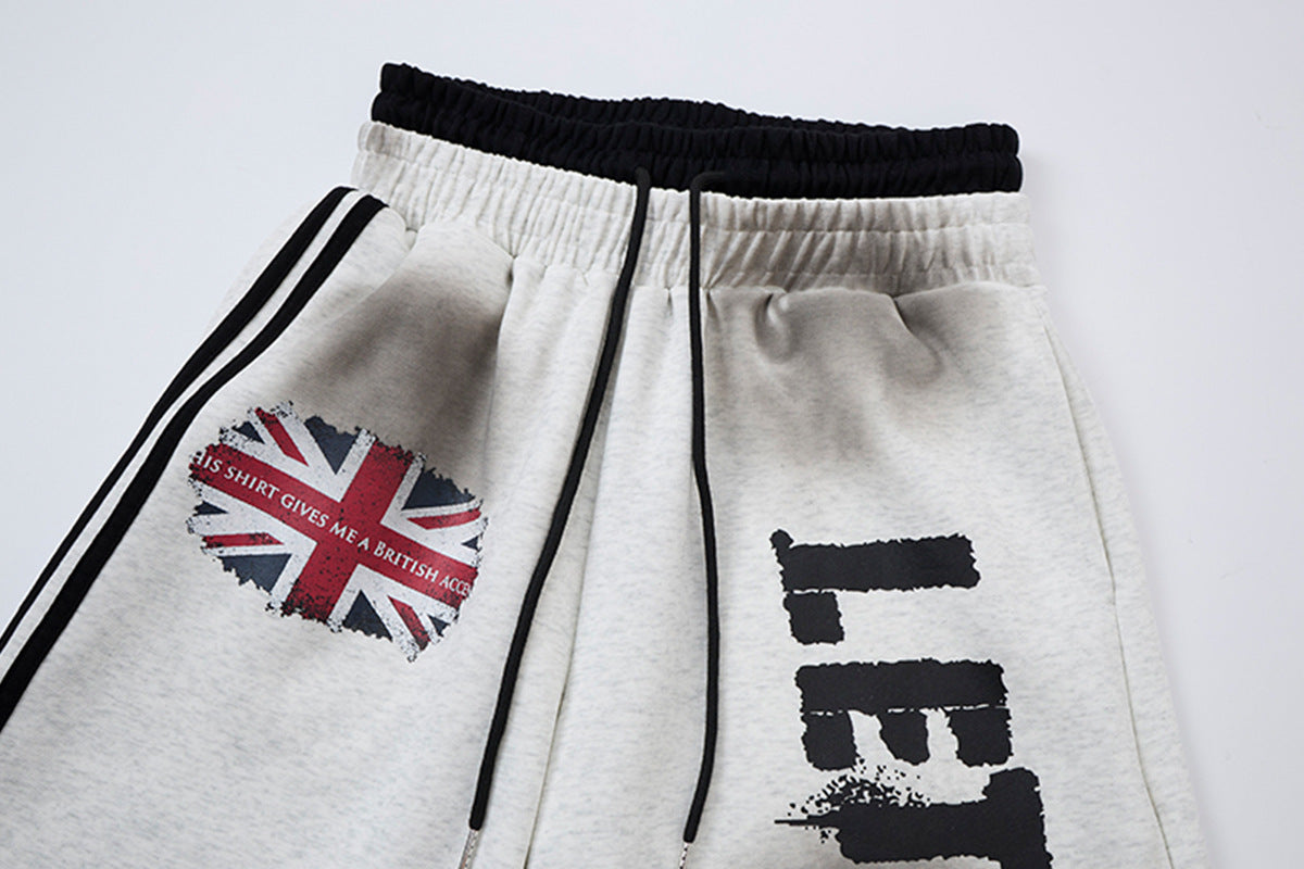 Wide-Leg-Sweatpants mit Union-Jack- und „Let's Rock On“-Print, Seitenstreifen
