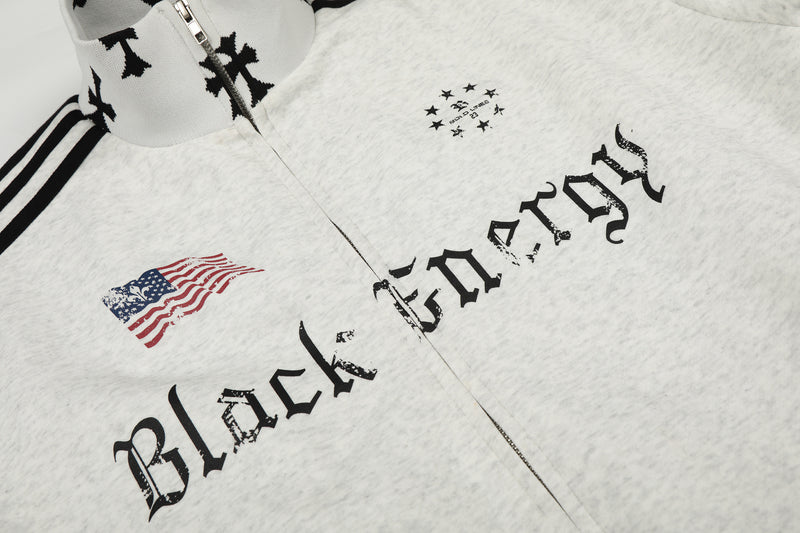 Veste de survêtement noire Black Energy à col montant et zip intégral, manches rayées et croix imprimée