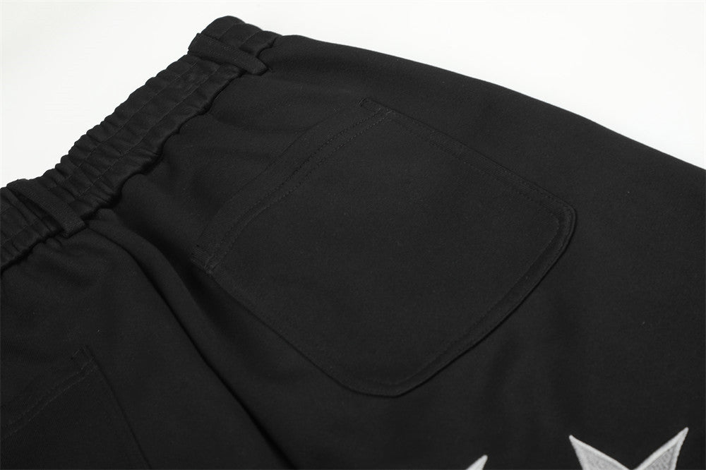 Pantalon de survêtement à jambes larges avec broderie Pégase, imprimé Union Jack et écussons étoile