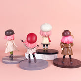 The Spy x Family Detective Anya PVC Figure Set features four 14 cm figures, each in unique outfits: trench coat with cap, coat with bonnet, brown coat with hat, and dress with beret. Inspired by movie version poses, they stand on circular platforms against a pink background facing away from the viewer.