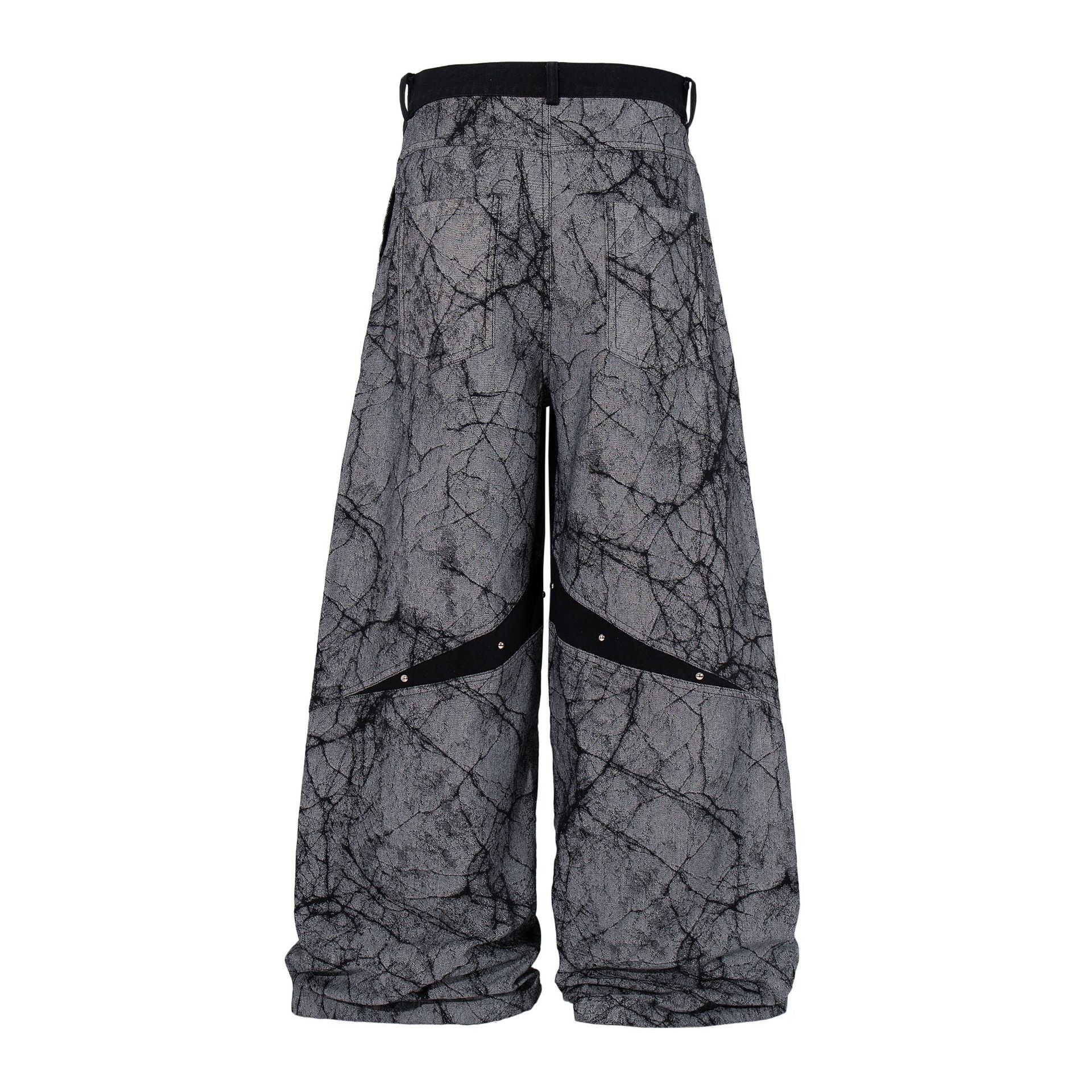Jean baggy à jambes larges avec imprimé craquelé et rayures diagonales cloutées