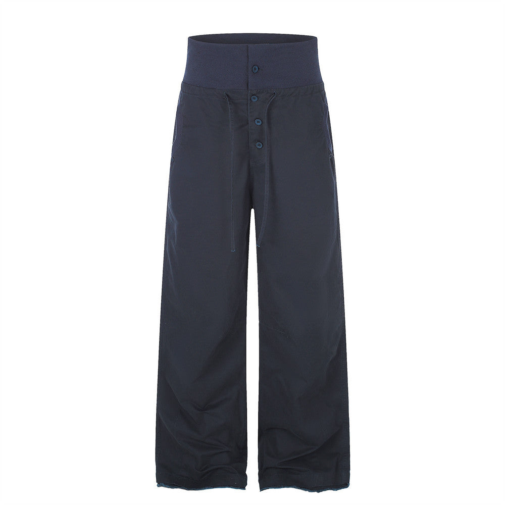 Pantalon palazzo à jambes larges – Taille haute, braguette à boutons, ceinture côtelée et ourlet brut