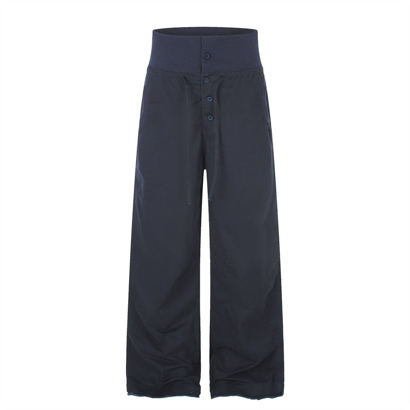 Pantalon palazzo à jambes larges – Taille haute, braguette à boutons, ceinture côtelée et ourlet brut