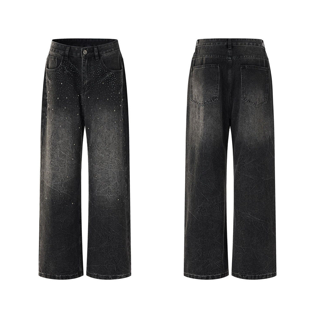 Men's washed black straight-leg jeans with scattered rhinestone embellishment and crinkle distress finish, front and back vie