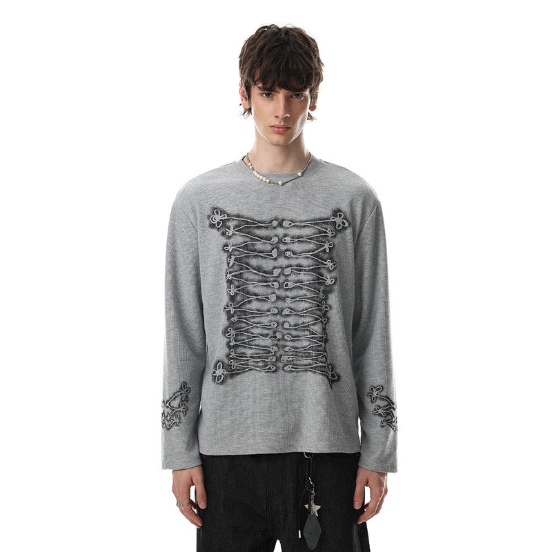 Gray oversized long sleeve crew neck tee worn by male model with rope-knot lace-up front graphic