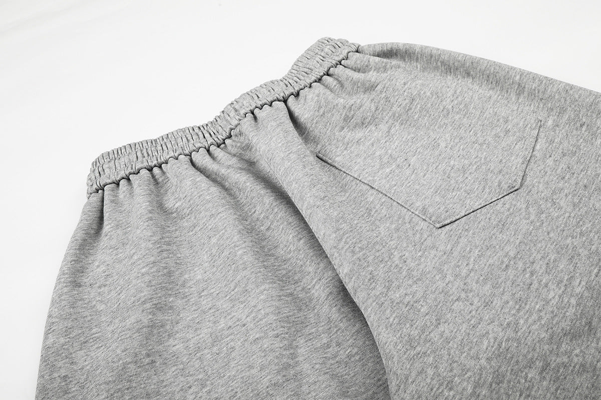 Pantalon de survêtement à jambes larges avec motif FU en strass et délavage vintage