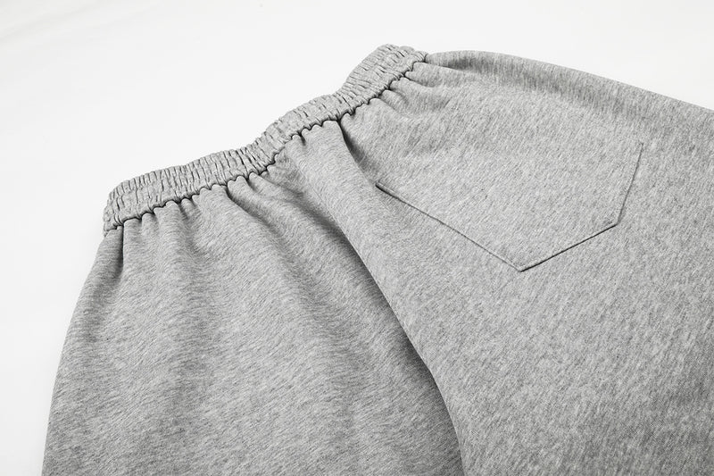 Pantalon de survêtement à jambes larges avec motif FU en strass et délavage vintage