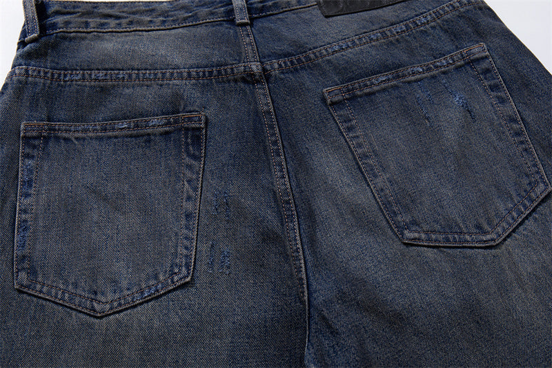 Wide-Leg Ripped Jeans – Vintage Washed Distressed Denim with Studded Patches