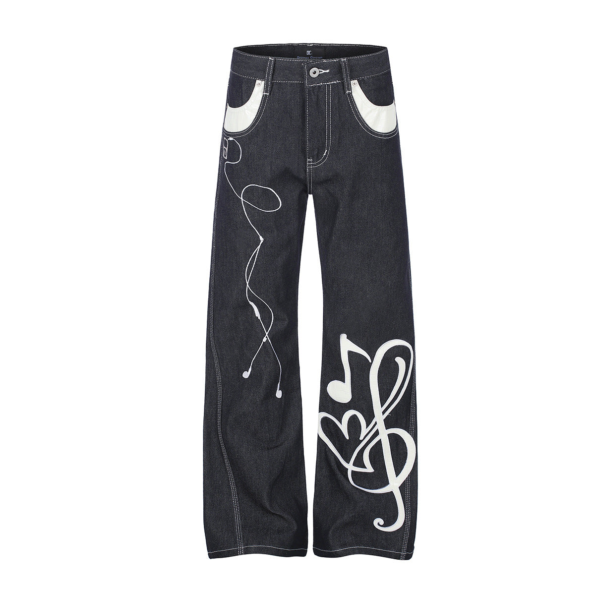 Jean baggy noir en denim brut à jambes larges, avec appliqué brodé blanc en cuir représentant une note de musique et une clé de sol sur le devant de la jambe et b
