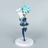 The Hatsune Miku Holding Cinnamoroll 21cm PVC Figure features the iconic character in teal hair and attire, holding a white plush toy with a blue bow. Ideal for anime collectors, it stands on a white circular base against a plain background.