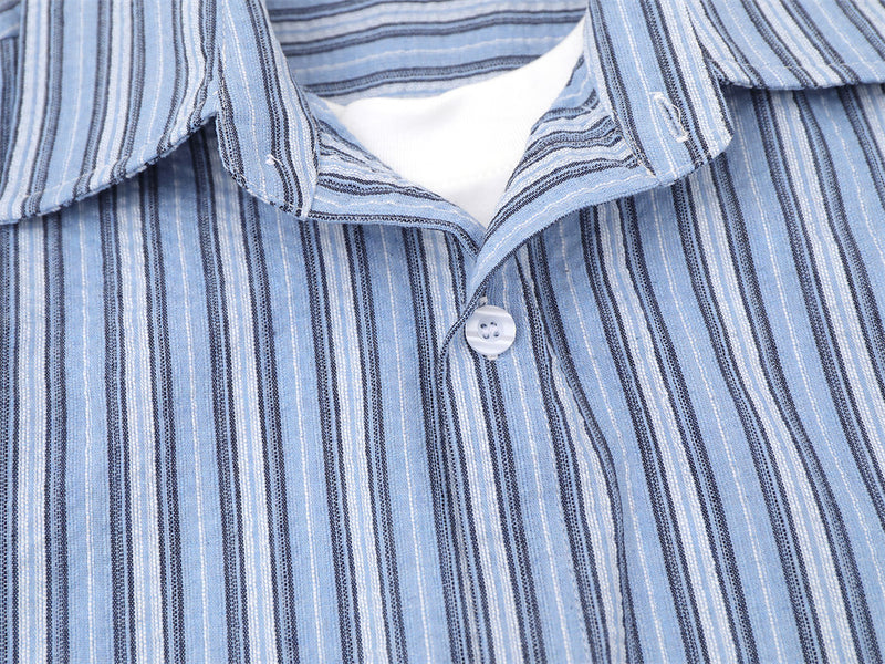 Blue striped shirt chest close-up with open collar and front button