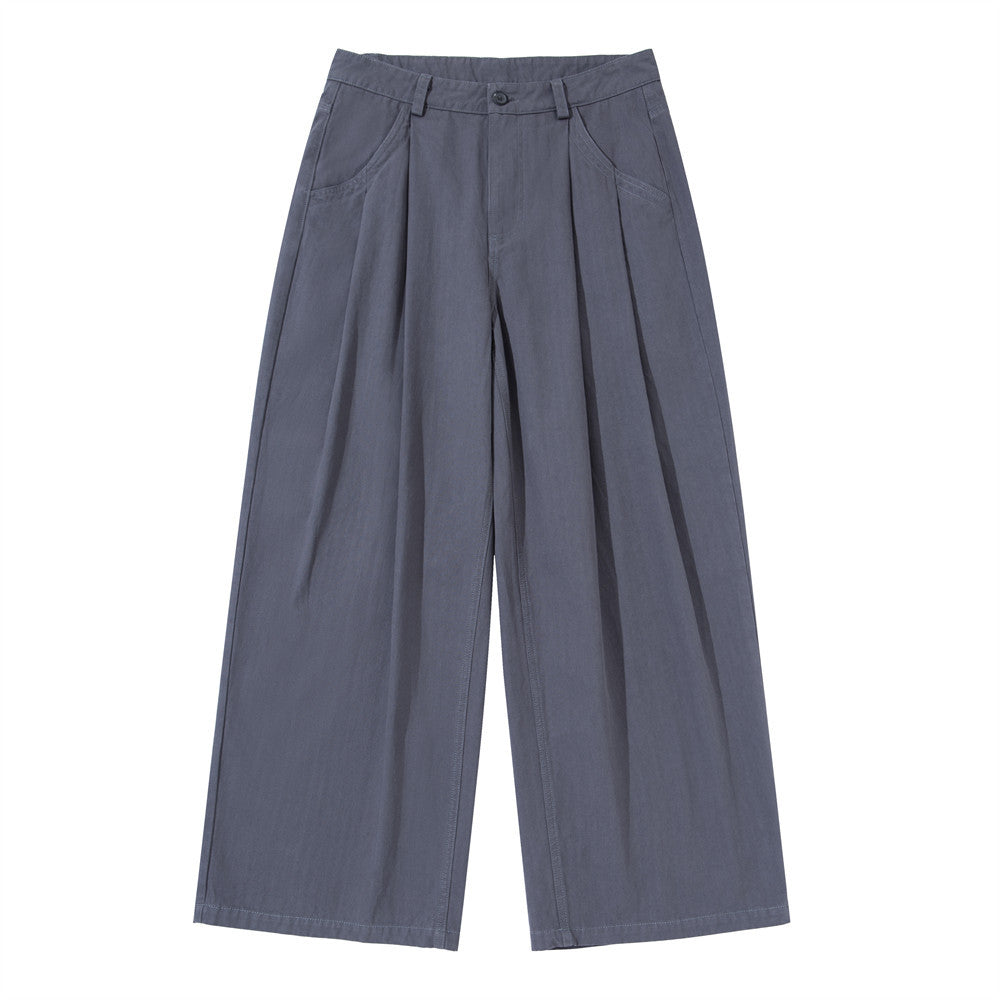 Men's wide-leg pleated trousers in slate blue with patch pockets and double front pleats, front view