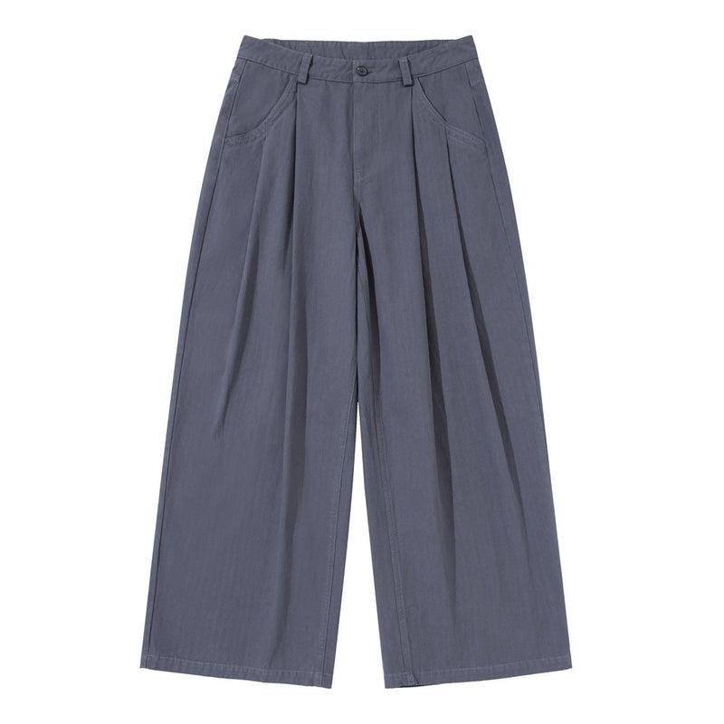 Men's wide-leg pleated trousers in slate blue with patch pockets and double front pleats, front view