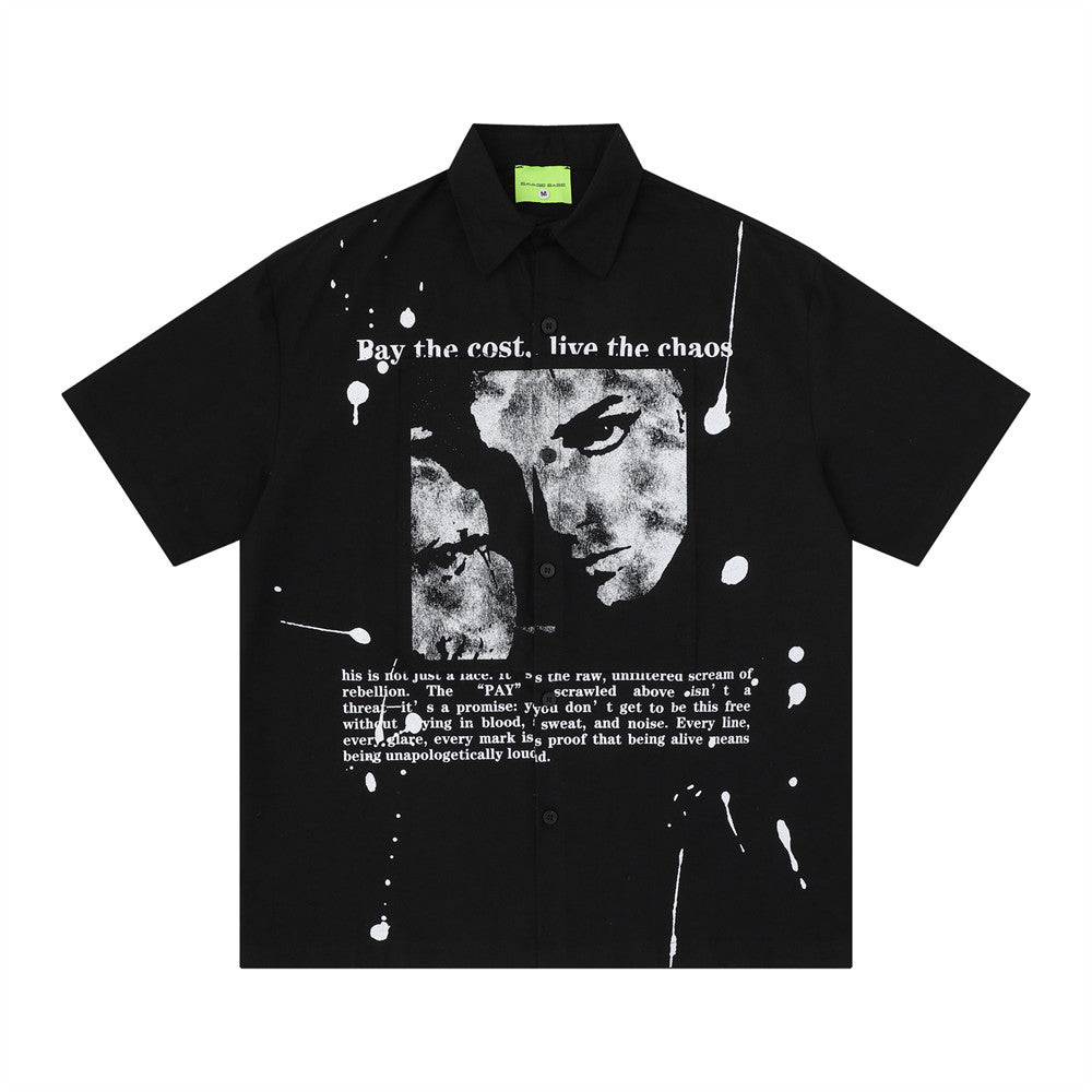 Men's oversized black short-sleeve shirt with ink splatter and distressed portrait graphic print on the front