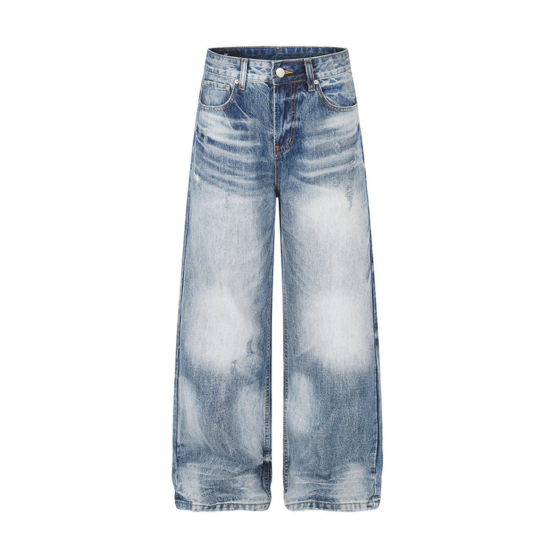 Jean baggy clair coupe large, effet usé marqué en moustaches et délavage nuageux décoloré, vues avant et arrière