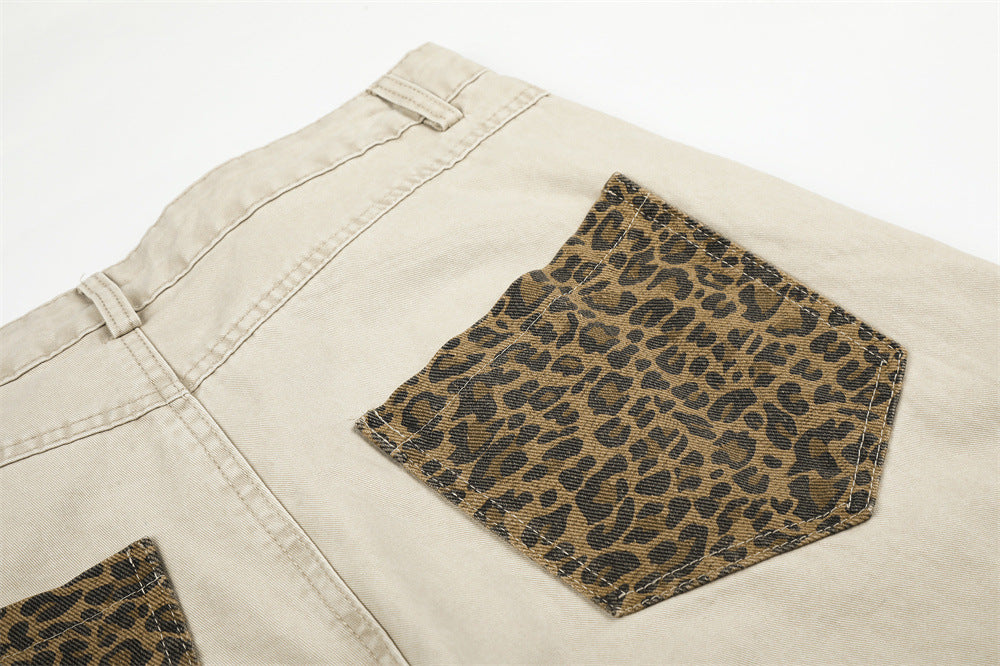 Pantalones de Pierna Ancha con Patchwork de Leopardo – Corte Baggy Deconstruido y Bajo Curvado