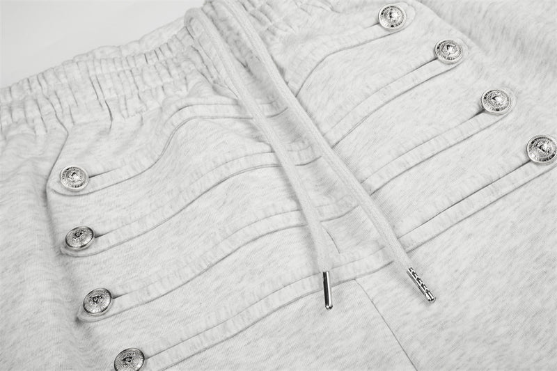 Jogging homme coupe large avec détails de boutons croisés et taille élastique