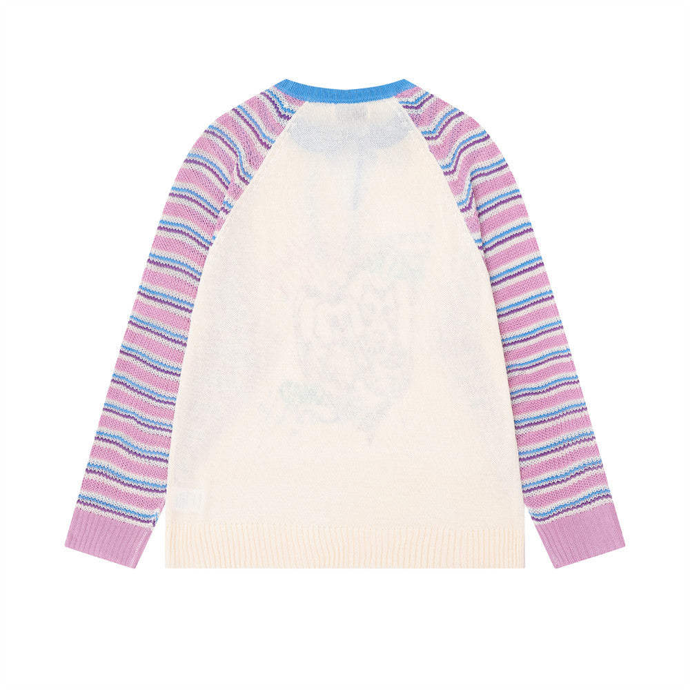 Pull en maille rayé colorblock à manches raglan avec col à lien