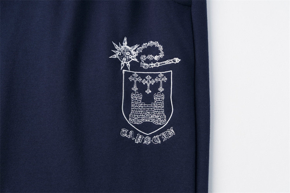 Pantalon de survêtement homme à jambes larges avec écusson brodé et imprimé graphique en écriture