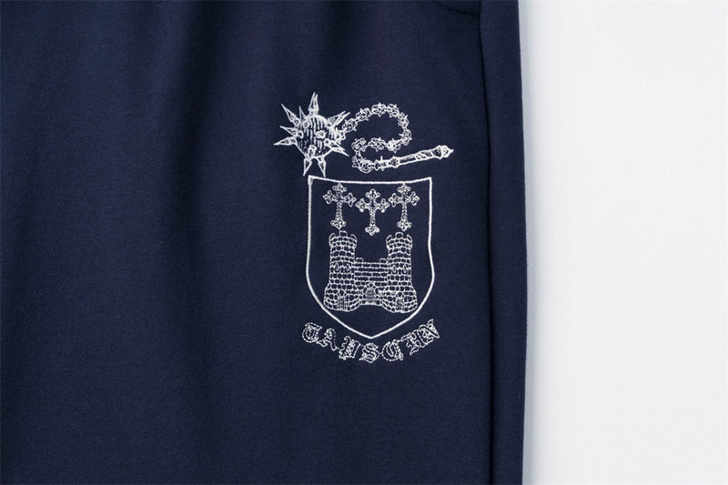 Pantalon de survêtement homme à jambes larges avec écusson brodé et imprimé graphique en écriture