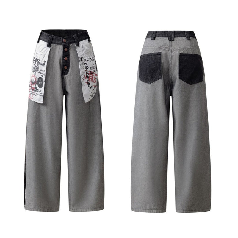 Men's wide-leg straight grey denim jeans with oversized graphic patch waistband, button fly, and black contrast side stripe