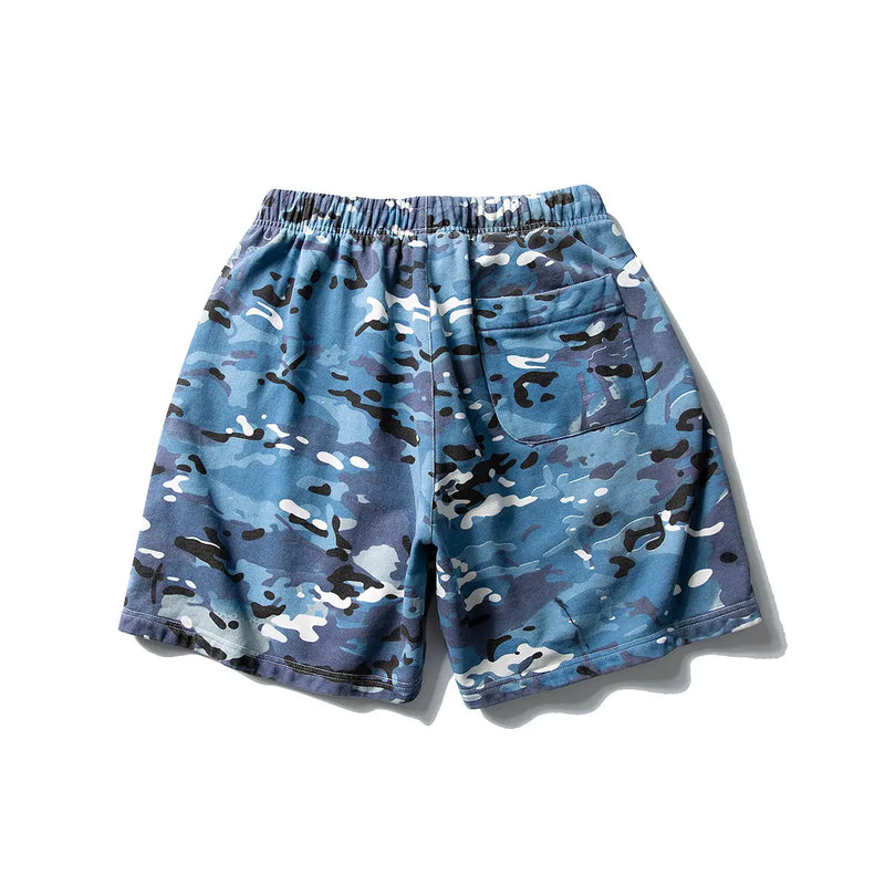 Men's Blue Camo Drawstring Shorts—relaxed fit cotton camouflage shorts with elastic waistband and single back pocket, a stylish streetwear essential shown on a white background.