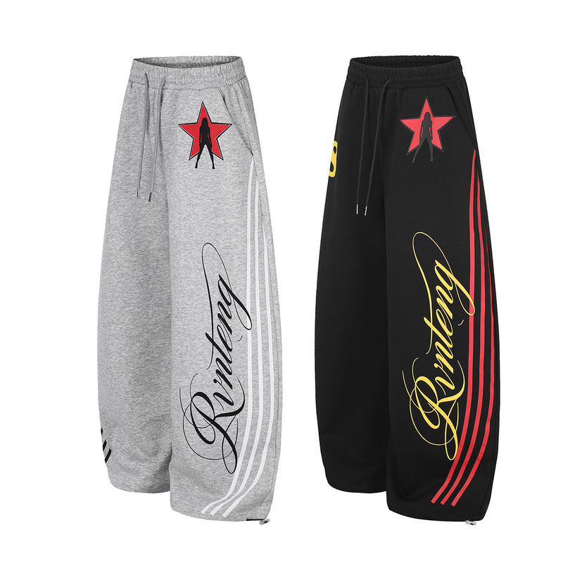 Pantalon de survêtement à jambes larges avec rayures rétro et imprimé graphique