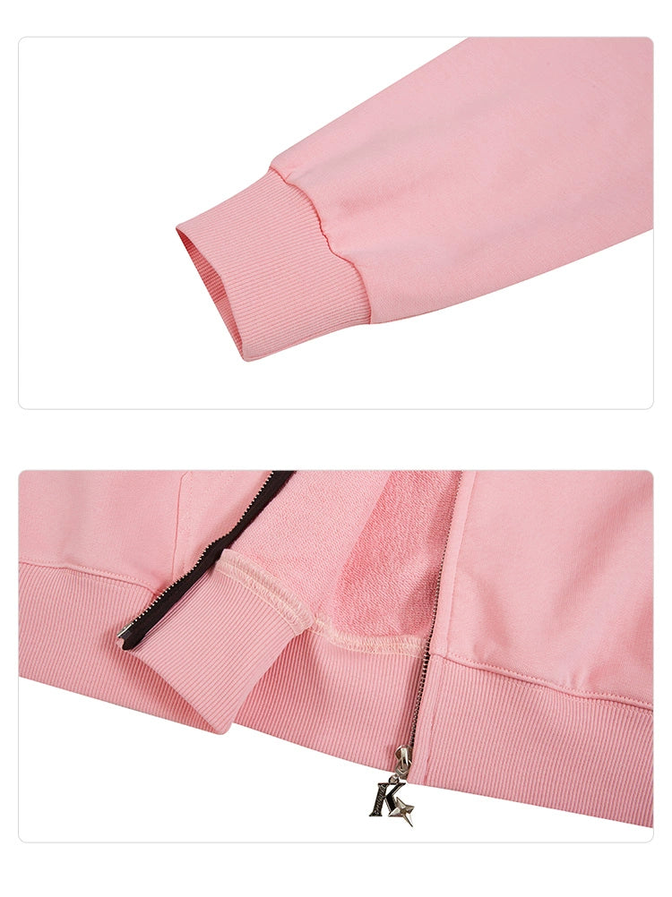 Close-up of the Seakoff Batman-Inspired Hoodie - 400GSM Oversized Pink Zip-Up Superhero Sweatshirt, highlighting the ribbed cuff and bottom hem with a zipper pull. The soft fabric is perfect for superhero fans.