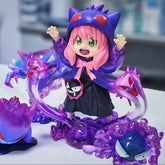 The Spy x Family Anya Forger PVC Figure, a 17 cm collectible, showcases Anya with pink hair and green eyes dressed in a purple Gengar cosplay. The figure features cat-like ears and red eyes surrounded by ghostly purple forms on a white base. Available in black & white options.