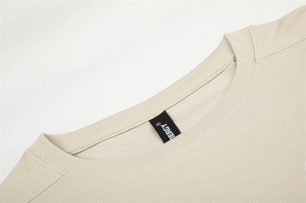 Beige crew neck collar detail with textured knit fabric