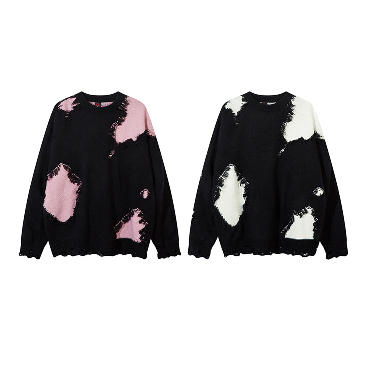 Pull oversize en maille délavée à empiècements contrastés, bords frangés, en noir et rose, vue de face