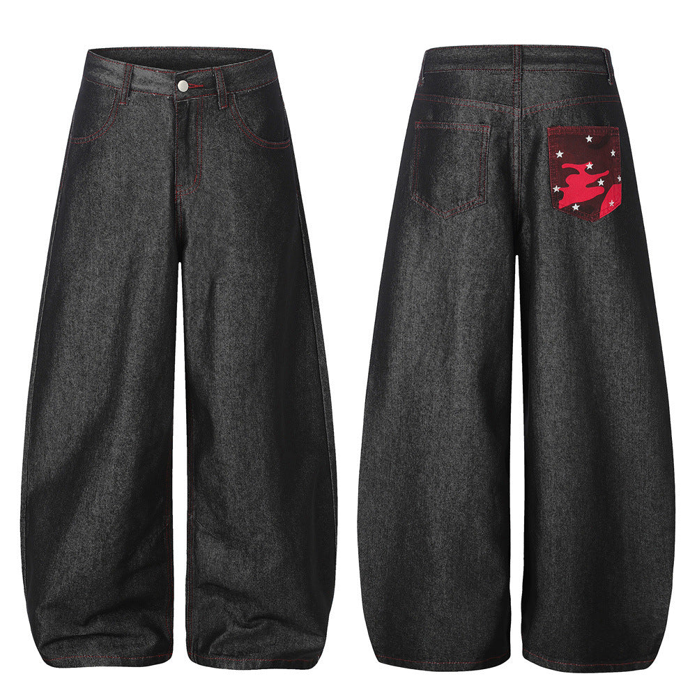 Men's dark black wide-leg barrel jeans with red topstitching and red camouflage star-embroidered back pocket, front and back