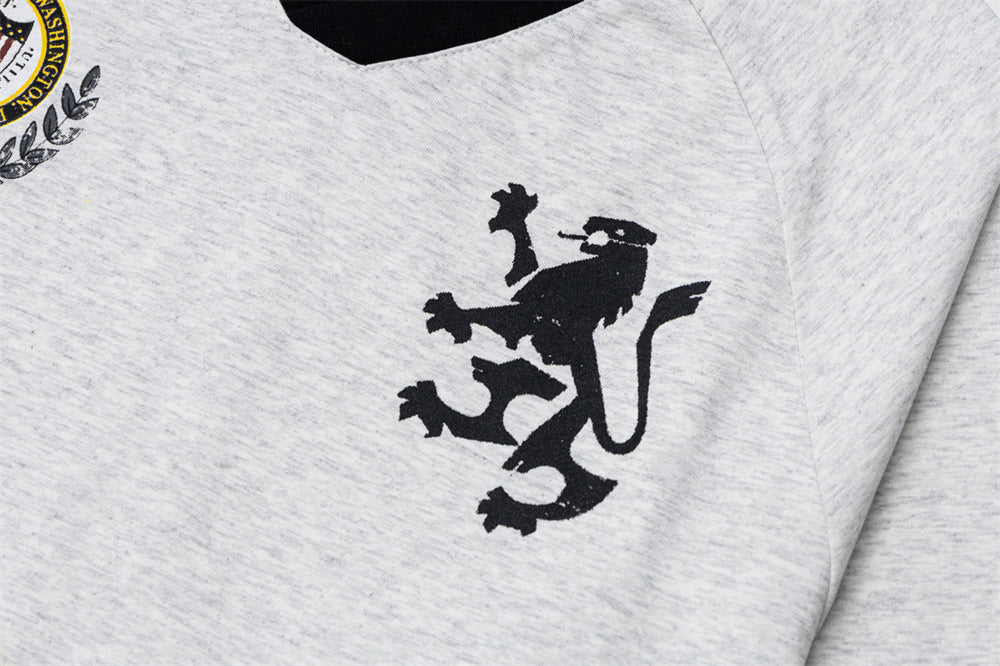 Maillot de soccer homme à manches longues et col en V avec écussons