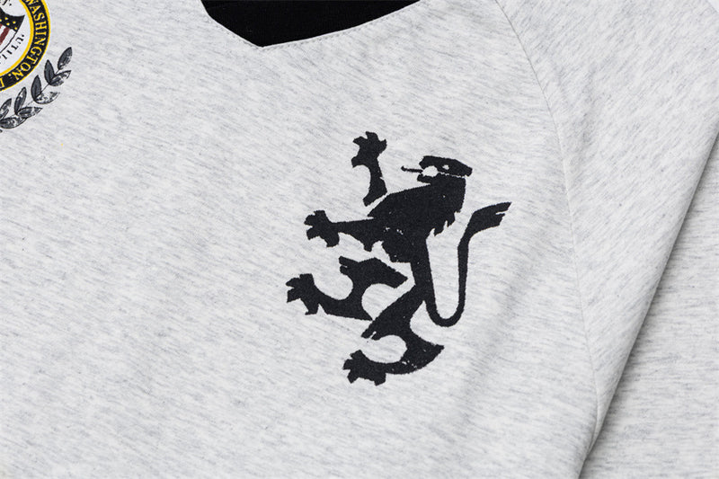 Maillot de soccer homme à manches longues et col en V avec écussons